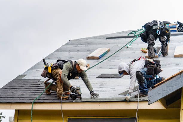 Professional Gutter Installation technician working in Mercer Island, WA